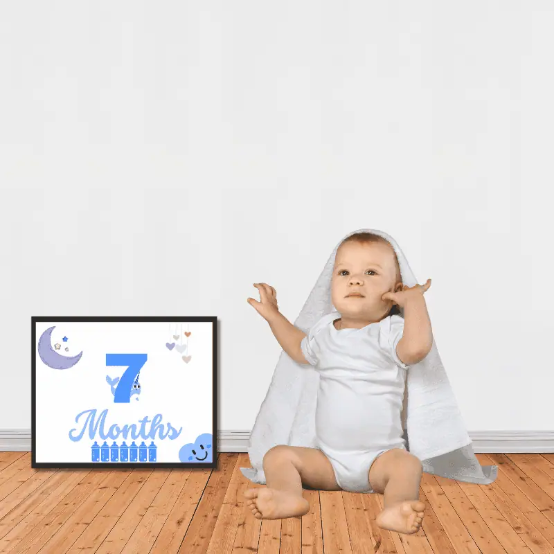 7 month old boy with a milestone printable
