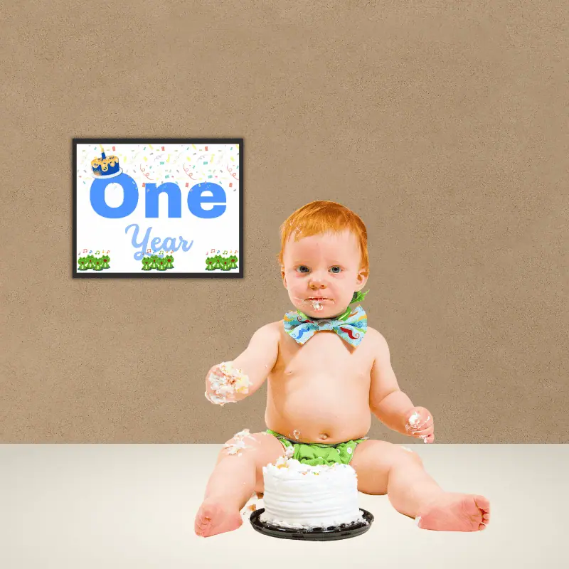 8 one year old boy with a milestone card