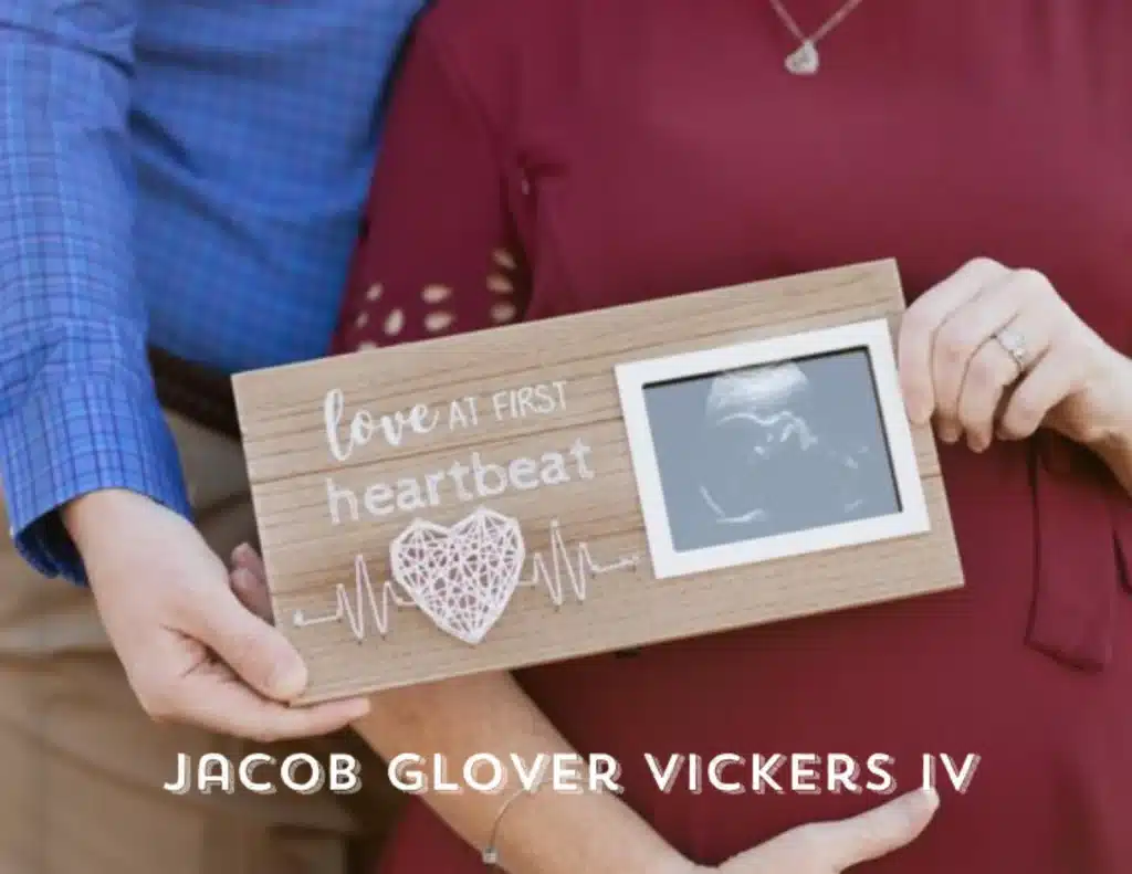 Cover of a Custom Photo Book with a closeup photo of expecting parents holding an ultrasound near the mother's belly